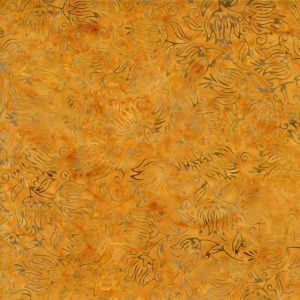 Decorative orange textile pattern with abstract floral swirls and leaves; a warm background design.